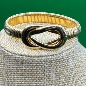 Vintage Signed Monet  Gold Toned Infinity Knot Serpentine Stretch 8” Bracelet